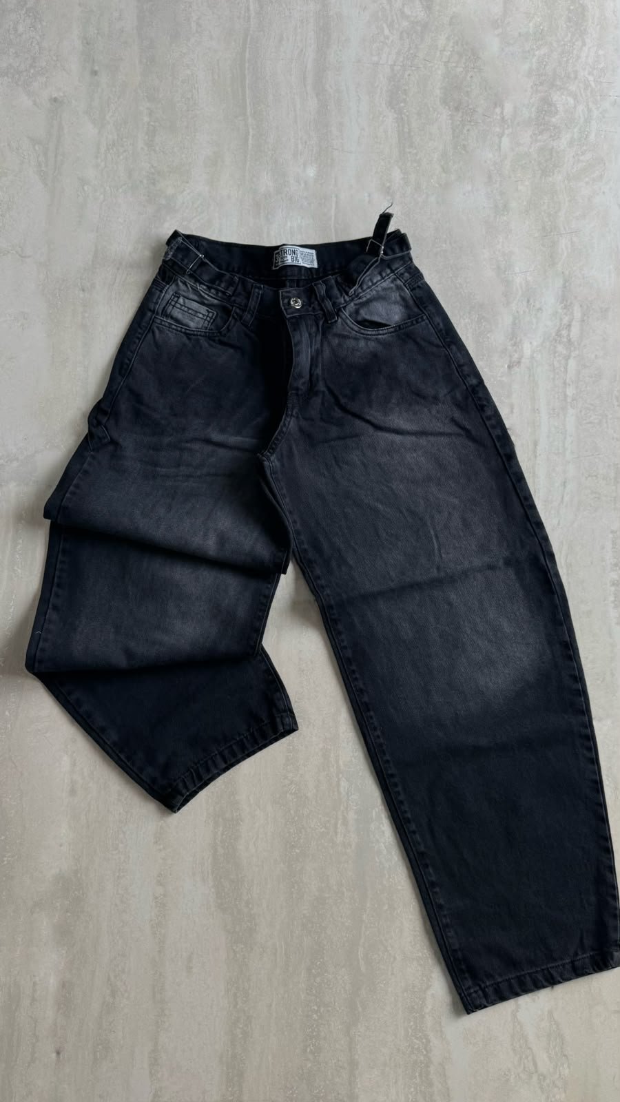 b3dfc5e1-3fe6-4cbd-83f1-1d5a2ade0aff Jeans baggy gris oscuro - Imagen 1